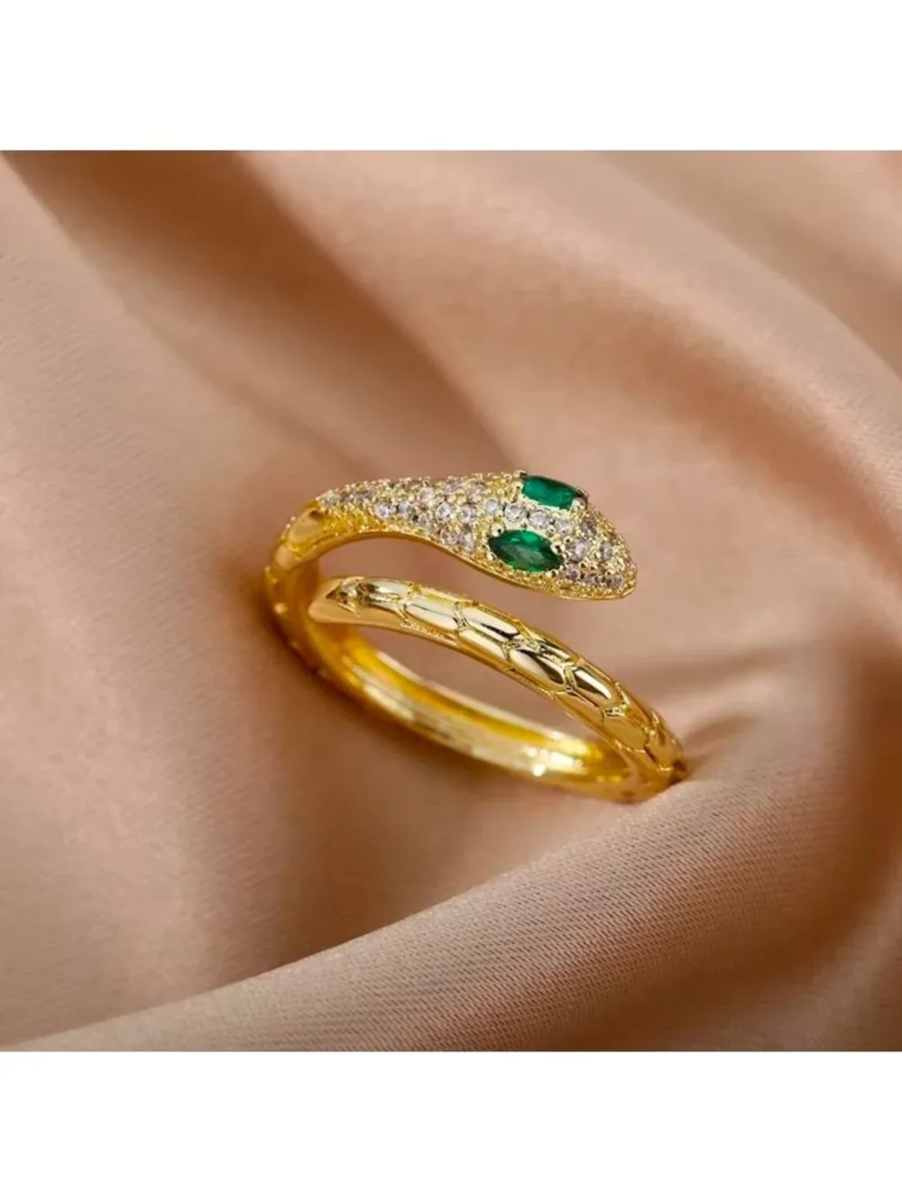 Gold Snake Ring with Emerald Accents